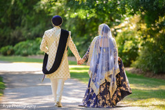Indian bride and groom walking outside Indian bride and groom walking outside