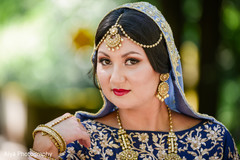 Indian bride glowing in her wedding attire. Indian bride glowing in her wedding attire.