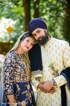 Indian bride and groom having a tender moment Indian bride and groom having a tender moment
