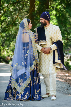 Indian bride and groom looking at each other Indian bride and groom looking at each other