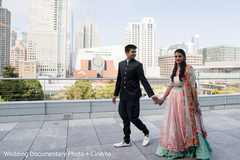 Indian bride and groom holding hands Indian bride and groom holding hands