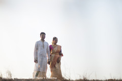 Indian bride and groom taking pictures Indian bride and groom taking pictures