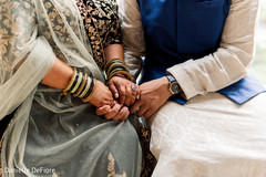 Closeup capture of Indian couple holding hands. Closeup capture of Indian couple holding hands.