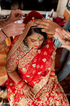 Maharani being helped to put her Ghoonghat on. Maharani being helped to put her Ghoonghat on.