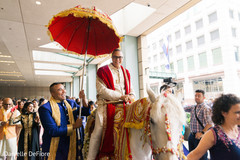 Elegant Indian groom during the Baraat celebration. Elegant Indian groom during the Baraat celebration.