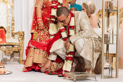 Indian bride and groom during the saptapadi ritual. Indian bride and groom during the saptapadi ritual.