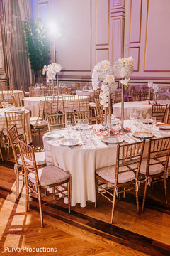 Unique Indian wedding reception table centerpiece. Unique Indian wedding reception table centerpiece.