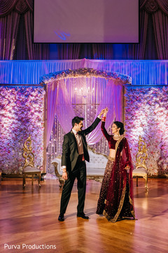 Elegant Indian couple's first dance photo. Elegant Indian couple's first dance photo.