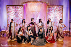 Glamorous Indian bride posing with bridesmaids. Glamorous Indian bride posing with bridesmaids.