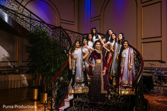 Indian bride and bridesmaids posing on the stairs. Indian bride and bridesmaids posing on the stairs.