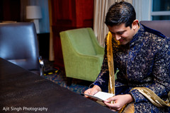 See this charming Indian groom reading bride's letter. See this charming Indian groom reading bride's letter.