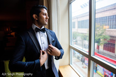 Lovely Indian groom looking out the window. Lovely Indian groom looking out the window.