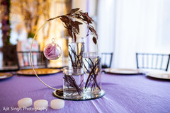 Unique Indian wedding reception table centerpiece. Unique Indian wedding reception table centerpiece.