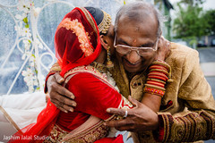 Tender moment between the bride and family Tender moment between the bride and family