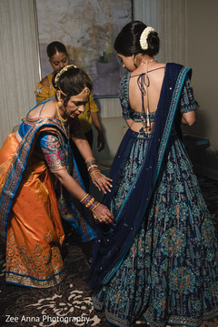 Indian bride putting her sairon. Indian bride putting her sairon.