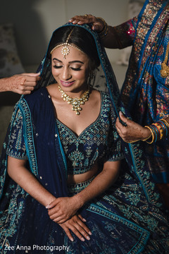 Lovely Indian bride getting her ghoonghat on. Lovely Indian bride getting her ghoonghat on.