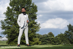 Elegant indian groom outdoors portrait. Elegant indian groom outdoors portrait.