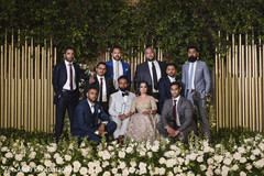 Dazzling indian couple with groomsmen portrait. Dazzling indian couple with groomsmen portrait.