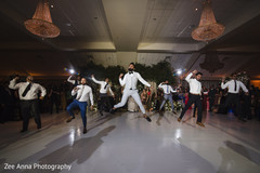 Joyful indian groom with groomsmen showing some dance moves. Joyful indian groom with groomsmen showing some dance moves.