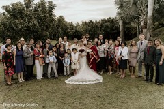 Marvelous Indian couple with Indian wedding guests capture. Marvelous Indian couple with Indian wedding guests capture.
