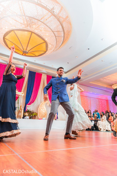 Upbeat Indian Sangeet guests dance. Upbeat Indian Sangeet guests dance.