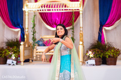 Indian bridesmaid at a special sangeet presentation. Indian bridesmaid at a special sangeet presentation.