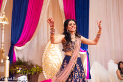 Marvelous Indian bride dancing at sangeet celebration. Marvelous Indian bride dancing at sangeet celebration.