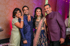 Marvelous portrait of Indian couple with guests. Marvelous portrait of Indian couple with guests.