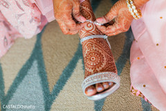 Indian bridal getting her anklet on. Indian bridal getting her anklet on.