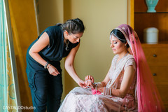 See this lovely Indian bride getting ready. See this lovely Indian bride getting ready.