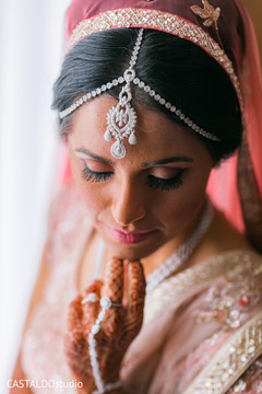 Indian bride posing with her matha patti. Indian bride posing with her matha patti.