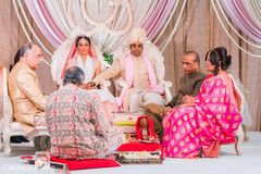 See this couple during traditional wedding ritual. See this couple during traditional wedding ritual.