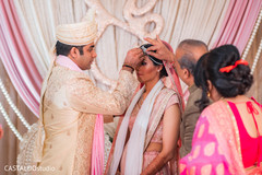 Indian bride and groom at the Malgasutra ritual. Indian bride and groom at the Malgasutra ritual.