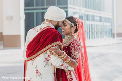 Indian bride and groom having a tender moment Indian bride and groom having a tender moment