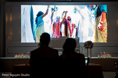 Highlight video being displayed at the reception Highlight video being displayed at the reception