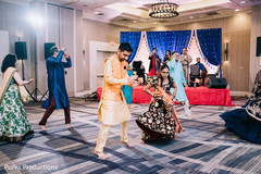 Indian bride and groom dancing at sangeet. Indian bride and groom dancing at sangeet.