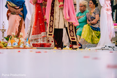 Indian groom stepping on the nuts ritual. Indian groom stepping on the nuts ritual.
