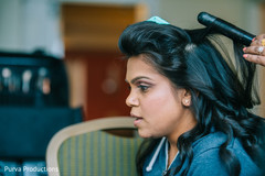 Lovely Indian bride getting her hair done. Lovely Indian bride getting her hair done.