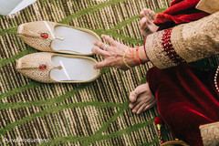 Indian groom putting his mohairs capture. Indian groom putting his mohairs capture.