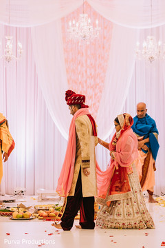 Indian bride walking with groom around sacred fire. Indian bride walking with groom around sacred fire.