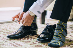 Indian groom putting his shoes on. Indian groom putting his shoes on.