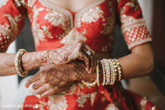 Indian bride showing her mehndi design Indian bride showing her mehndi design
