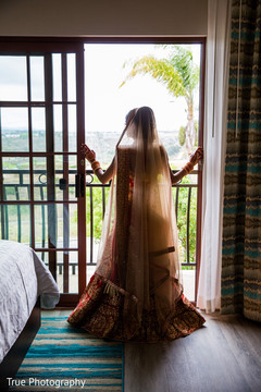Gorgeous Indian bride looking out the window. Gorgeous Indian bride looking out the window.
