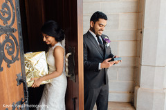 Indian bride and groom during gift exchange Indian bride and groom during gift exchange