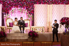Indian bride and groom listening to speeches Indian bride and groom listening to speeches