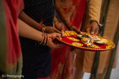 Indian bride holding with relatives the ritual items. Indian bride holding with relatives the ritual items.