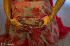Indian bride with turmeric past on her hands. Indian bride with turmeric past on her hands.