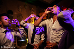 Indian groomsmen having a toast capture. Indian groomsmen having a toast capture.