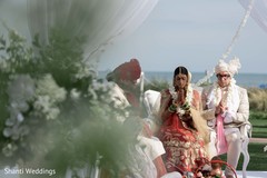 Indian bride and groom getting married Indian bride and groom getting married