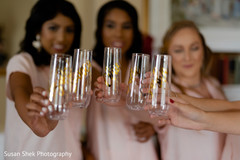 Indian bridesmaids showing their cups. Indian bridesmaids showing their cups.